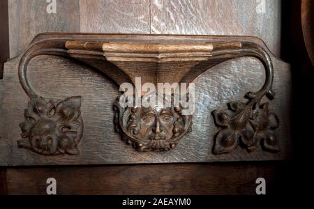 A green man misericord in St. Mary`s Church, Adderbury, Oxfordshire, England, UK Stock Photo